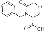 Elinzanetant Impurity 12; (R)-4-Benzyl-5-oxomorpholine-3-carboxylic acid  (CAS: 106973-36-8)